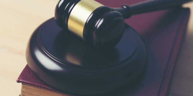 close-up-of-judge-hummer-on-wooden-background.jpg