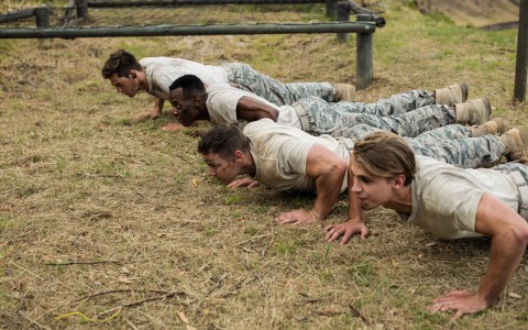 Soldiers performing pushup exercise. Training for Soldiers of the Cross
