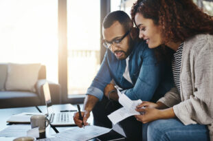 Young couple planning their budget