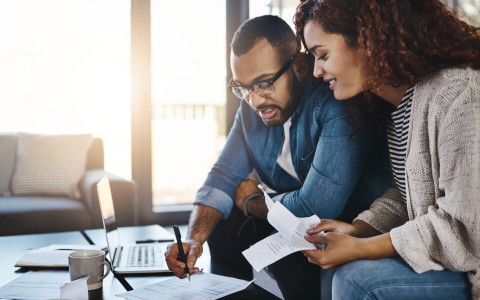 Young couple planning their budget