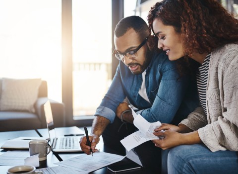 Young couple planning their budget