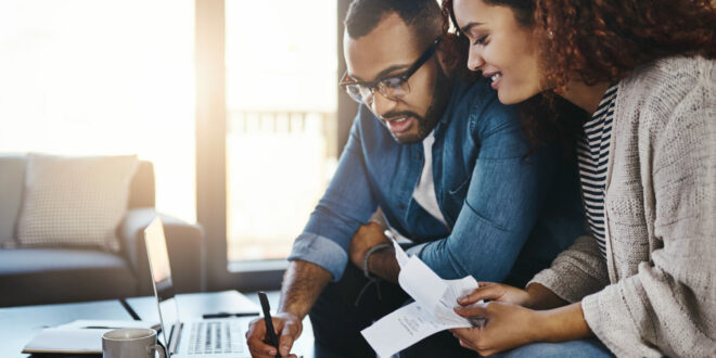 Young couple planning their budget