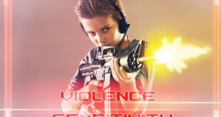 Young boy playing violent video game