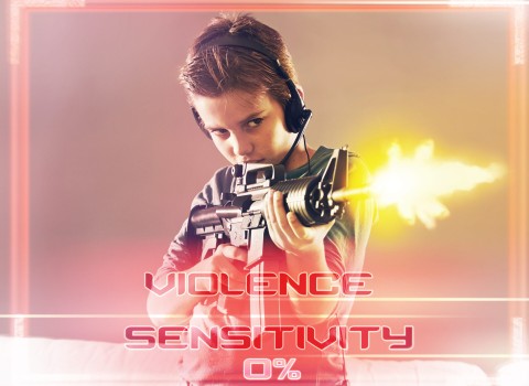 Young boy playing violent video game